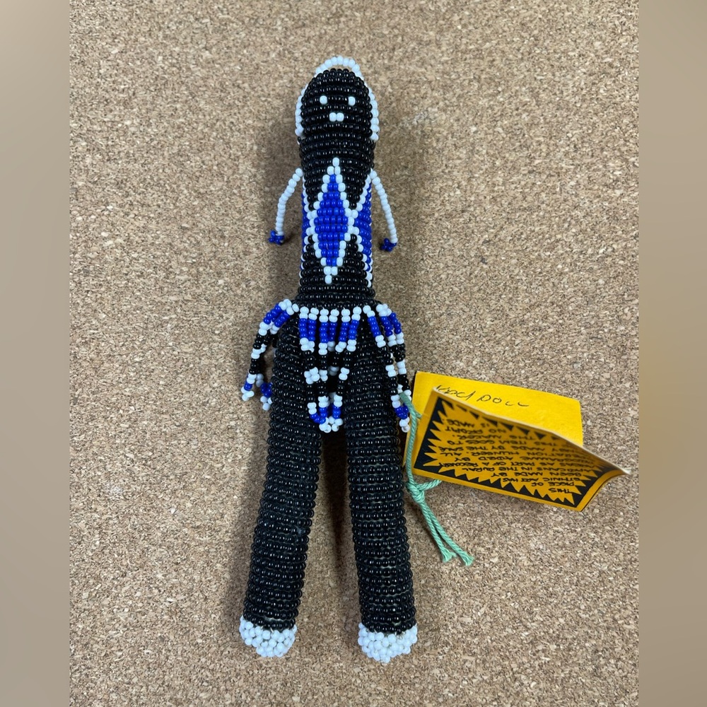 Vintage beaded doll